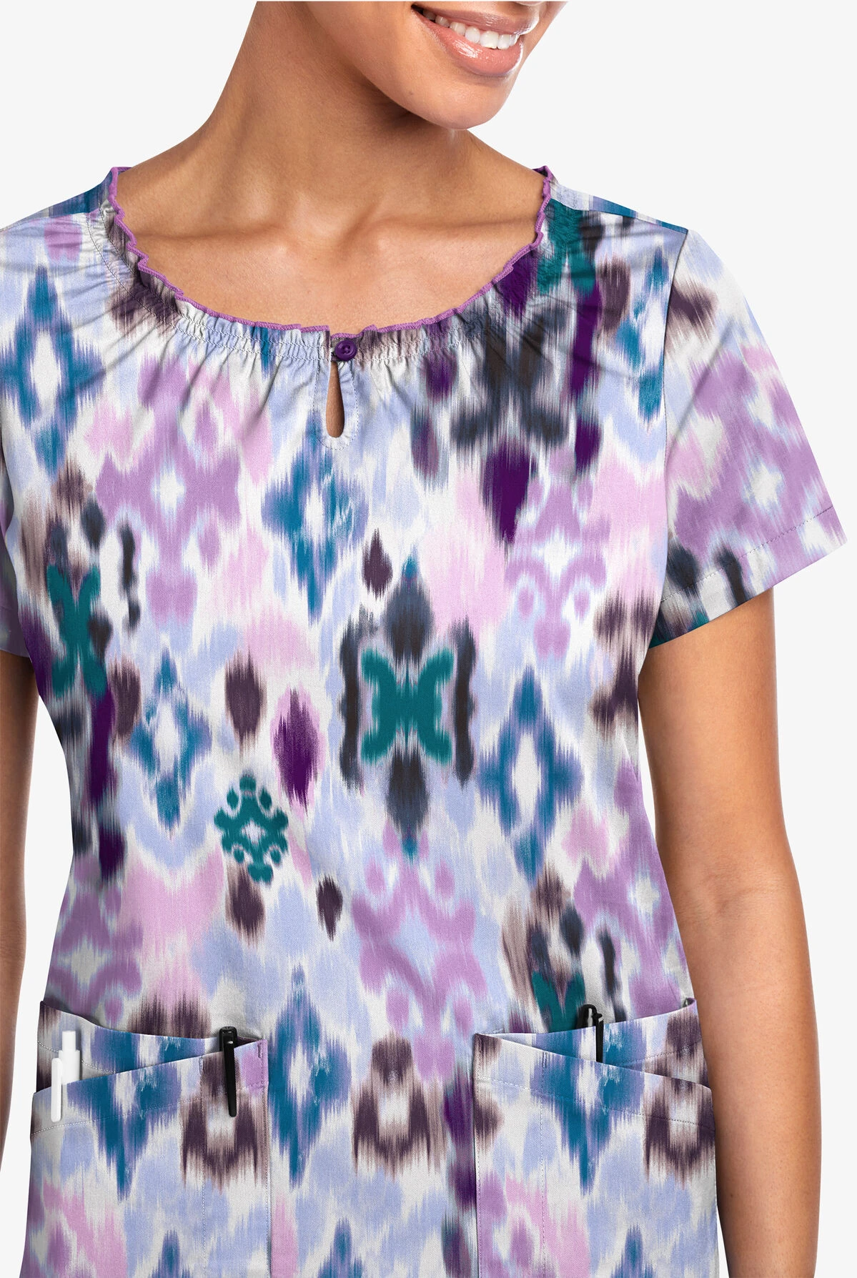 UA Butter-Soft STRETCH Varna Ikat Orchid Women's 6-Pocket Peasant Style Printed Scrub Top 2 UA Butter-Soft STRETCH Varna Ikat Orchid Women's 6-Pocket Peasant Style Printed Scrub Top - Image 2