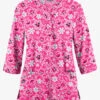 Butter-Soft Smiling Snowflakes Fuchsia Women's 2-Pocket Round Neckline Print Scrub Top